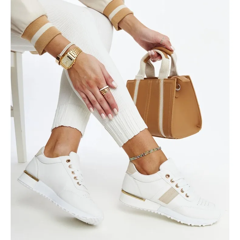 White and beige sneakers on the Nihad rubber platform