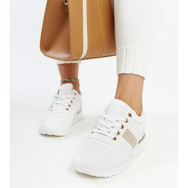 White and beige sneakers on the Nihad rubber platform